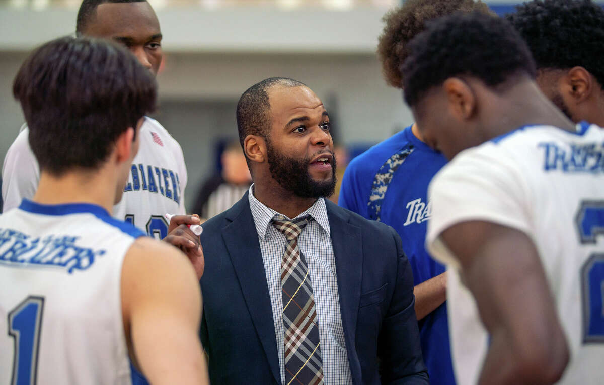 Lewis and Clark Community College head basketball coach Kavon Lacey instructs his team during a timeout in saturday's home game against Olney central. LCCC will open the postseason with a play-in game of the Region 24 Tournament at 2 p.m. Saturday at Shawnee College. 