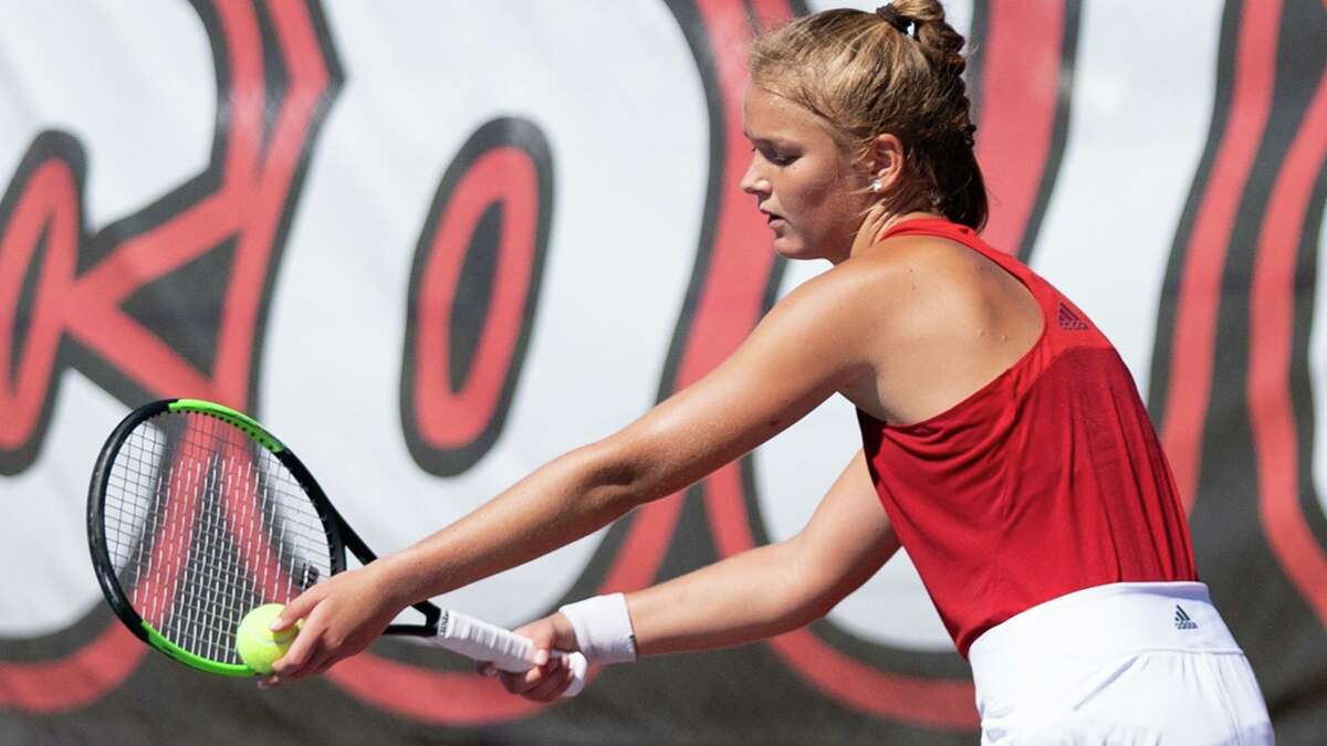 SIUE's Jill Lambrechts prepares to serve against Dayton on Saturday. SIUE beat Dayton 6-1 to win its sixth straight match.