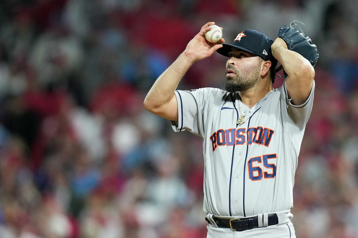 Houston Astros relief pitcher Jose Urquidy (65) adjust his cap in the sixth inning during Game 3 of the World Series at Citizens Bank Park on Tuesday, Nov. 1, 2022, in Philadelphia.