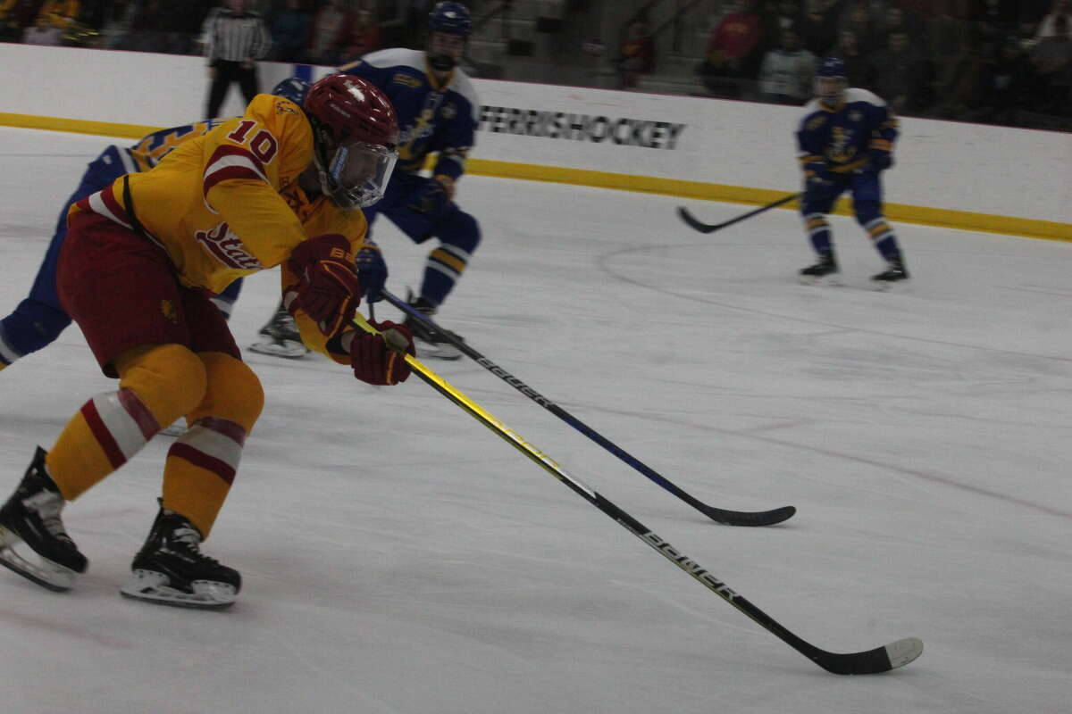 Ferris State's Bradley Marek takes the puck to the net against Lake Superior State on Saturday at the Ewigleben Ice Arena