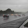 FILE: Cars commute on Highway 101 during heavy rain in San Francisco on Jan. 13, 2023. During another severe storm on Tuesday, the Crockett-Carquinez Fire Department responded to an Amtrak train that derailed, officials said. 