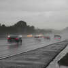 Cars commute on Highway 101 during heavy rain in San Francisco on Jan. 13, 2023. Three back-to-back storm systems are forecast to bring more rain to the Bay Area this week. 