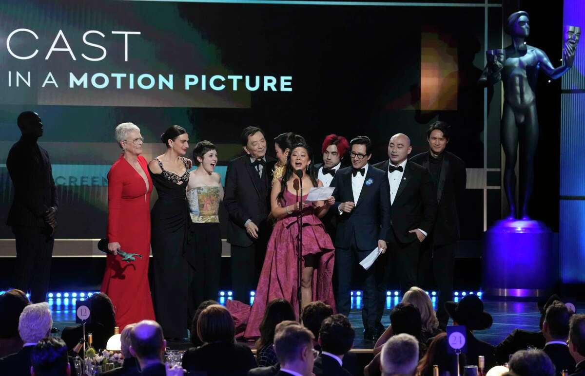 Stephanie Hsu, center, and members of the cast of "Everything Everywhere All at Once," accept the award for outstanding performance by a cast in a motion picture at the 29th annual Screen Actors Guild Awards on Sunday, Feb. 26, 2023, at the Fairmont Century Plaza in Los Angeles.