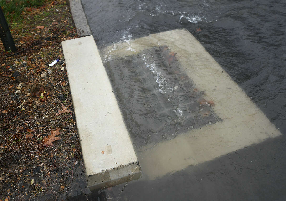 Water flows out from a storm drain in Bridgeport in December.