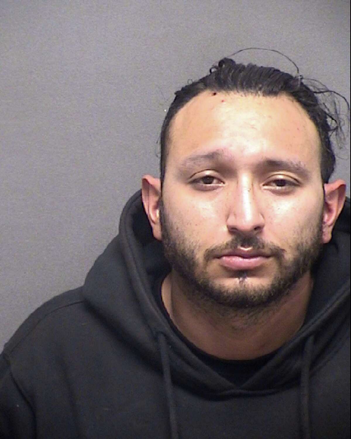 Christian Alexander Moreno, 31 is seen in a booking photo provided Feb. 25by the Bexar County Sheriff’s Department. Moreno is facing felony charges of attack by dangerous dog causing death and injury to an elderly person, the San Antonio Police Department said in a Facebook post.
