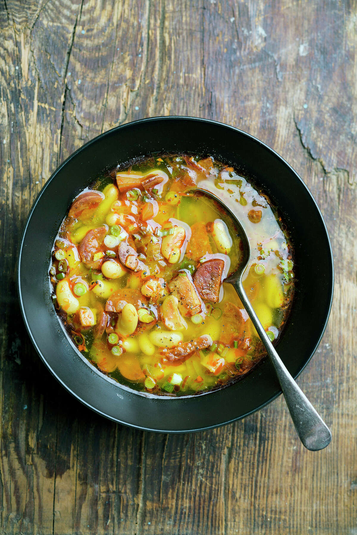 Spanish Chorizo, Ham and White Bean Stew is a satisfying, stick-to-your-ribs meal during colder months.