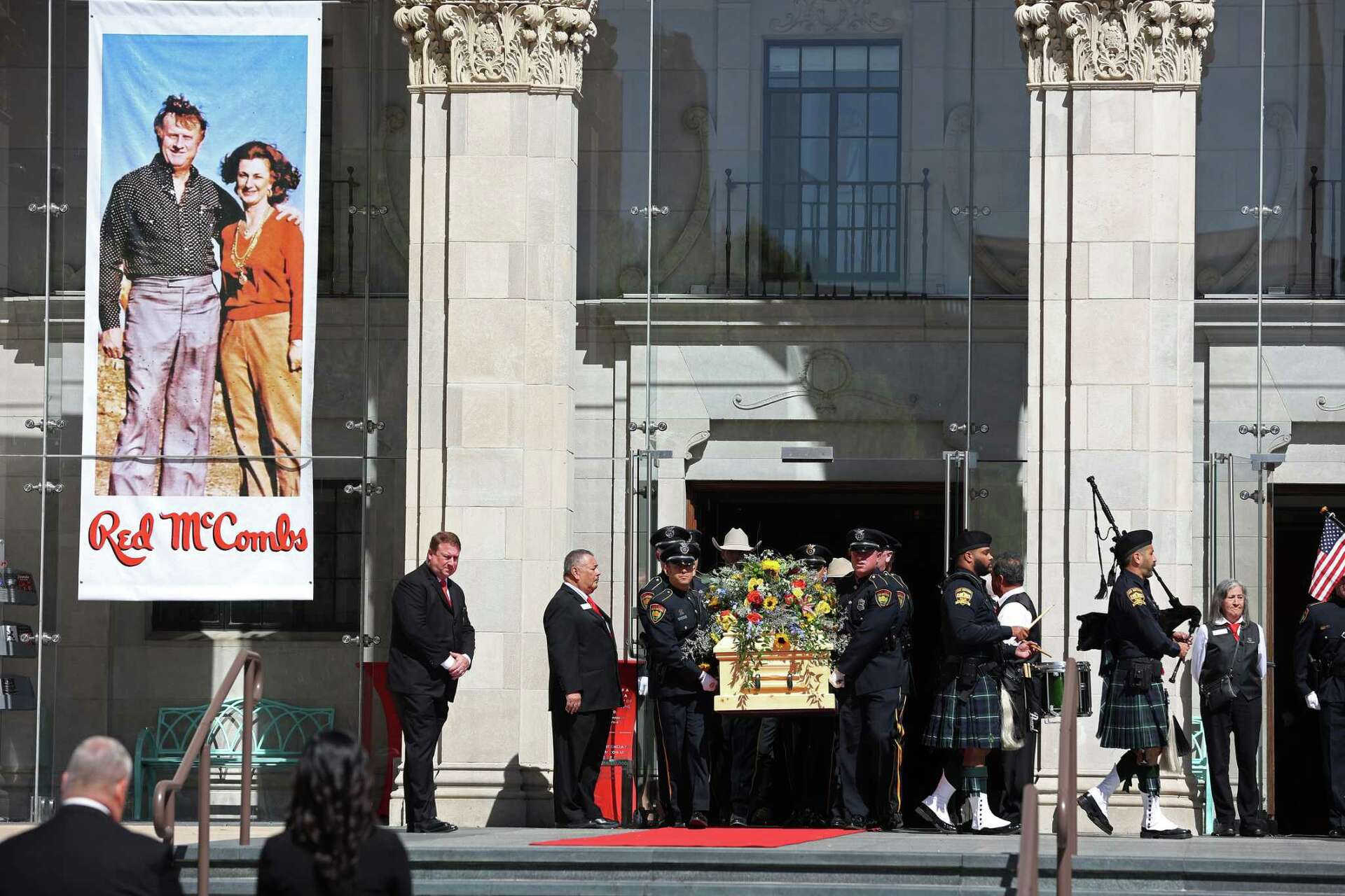 Red funeral draws large crowd to Tobin Center