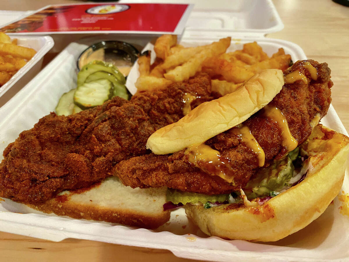 At Dave's Hot Chicken, a trendy, fast-growing national chain that opened its first Capital Region location in December, the menu consists of little more than large chicken tenders available with bread and pickles, left, or on a slider with slaw and a chipotle-mayo sauce.