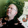 FILE - Scott Adams, creator of the comic strip Dilbert, talks about his work at his studio in Dublin, Calif., on Oct. 26, 2006. Adams experienced possibly the biggest repercussion of his recent comments about race when distributor Andrews McMeel Universal announced Sunday, Feb. 26 it would no longer work with the cartoonist. In an episode of his YouTube show last week, Adams described people who are Black as members of âa hate groupâ from which white people should âget away.â Various media publishers across the U.S. denounced the comments while saying they would no longer provide a platform for his work. (AP Photo/Marcio Jose Sanchez, File)