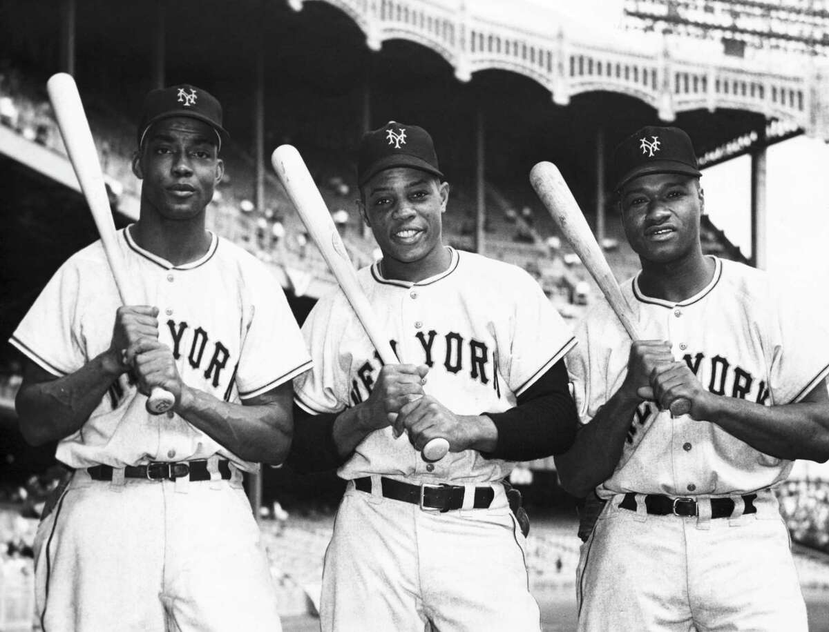 From left: Monte Irvin, Willie Mays and Henry Thompson of the New York Giants comprised the first all-black outfield in World Series history. 