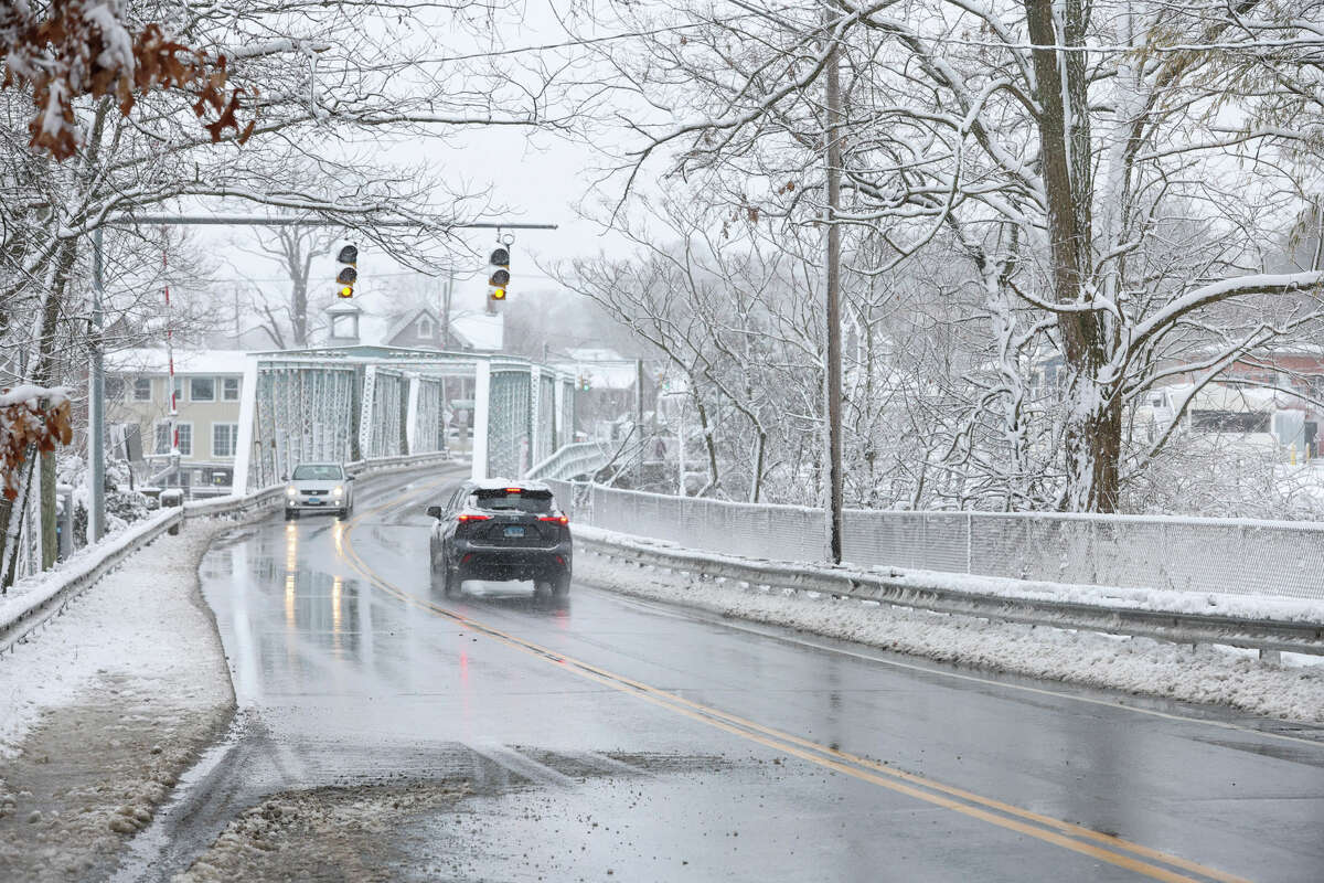 Drivers out in Westport, Conn. Tuesday, Feb. 28, 2023. The first widespread snow event of the season saw several inches fall across the state, closing schools and state offices.