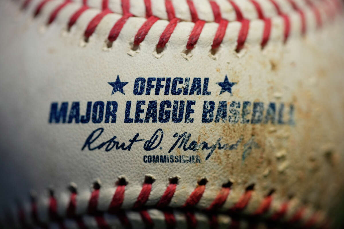 A logo is seen on an MLB baseball.