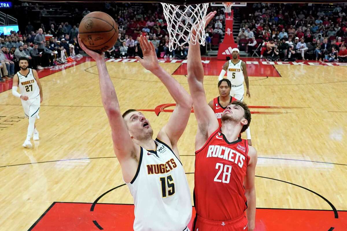 The Rockets' Alperen Sengun went head-to-head with his NBA idol Nikola Jokic as the two-time MVP and his Nuggets teammates had their way with Houston on Tuesday night.