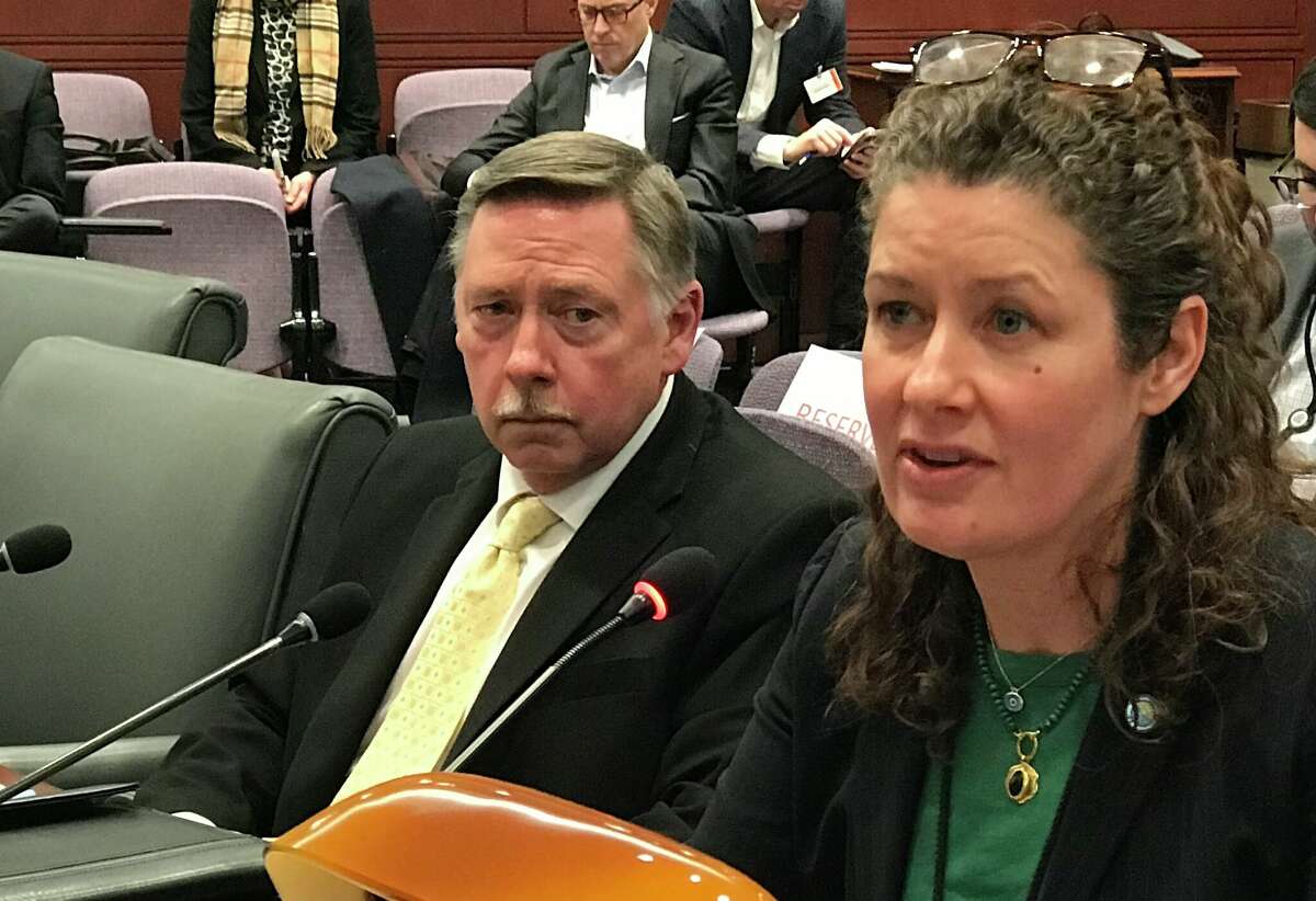 Mark Daley, left, CEO of the Materials Innovation and Recycling Authority, and Katie Dykes, commissioner of the Connecticut Department of Energy and Environmental Protection, testified at a task force on solid waste at the state Capitol Friday, Feb. 4, 2023. 