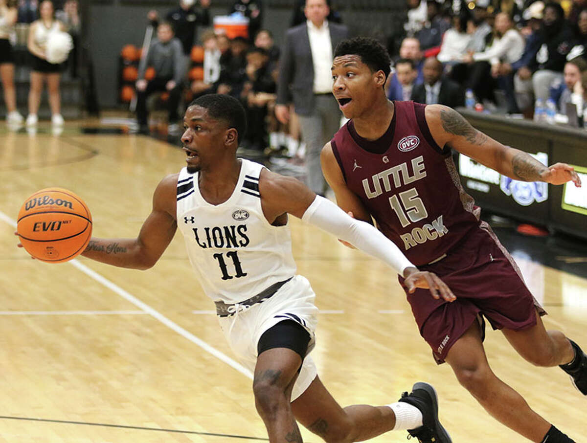 Lindenwood's Kevin Caldwell Jr. (11) drives past Little Rock's Myron Gardner on a drive to the basket on Saturday at Hyland Arena in St. Charles, Mo.