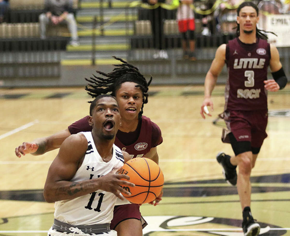 Lindenwood's Kevin Caldwell Jr. (11) beats Little Rock's Jordan Jefferson and Isaiah Palermo (right) on the break Saturday at Hyland Arena in St. Charles, Mo.