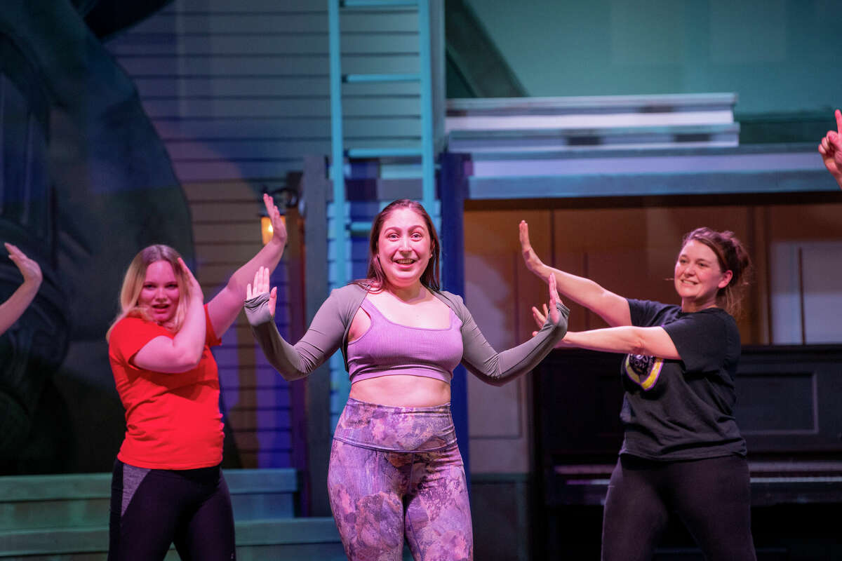 Sami Serrano, center, rehearses a scene as Evelyn Nesbit for the musical "Ragtime." The show opens Friday at the Woodlawn Theatre.