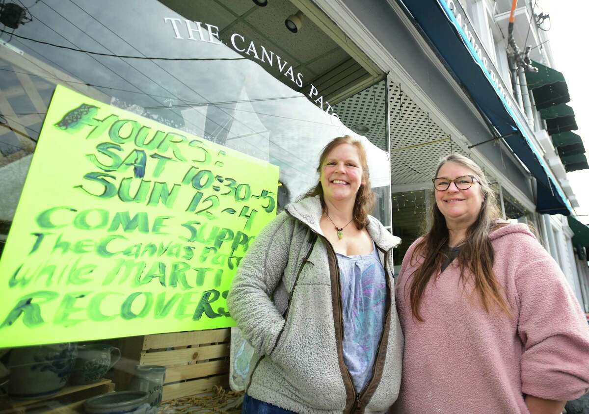 Sisters Carrie and Susan Reed are running The Canvas Patch, their mother Marti Reed's downtown retail business, while she recovers from a broken hip and hip replacement surgery, in Milford, Conn. on Wednesday, March 01, 2023.