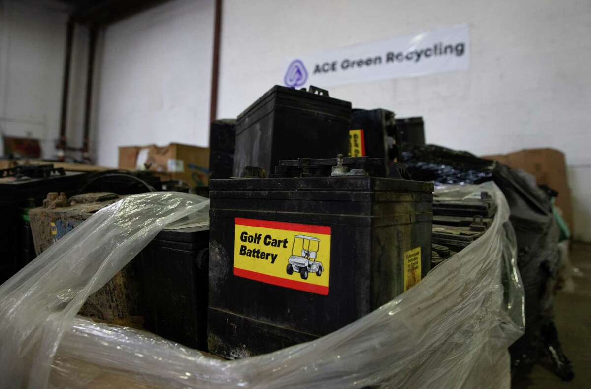 Stacks of lead-acid battery are photographed at the ACE Battery storage/distribution warehouse Wednesday, March 1, 2023, in Houston. The new start-up is building the facility to extract lithium from lithium batteries for reuse in the future.