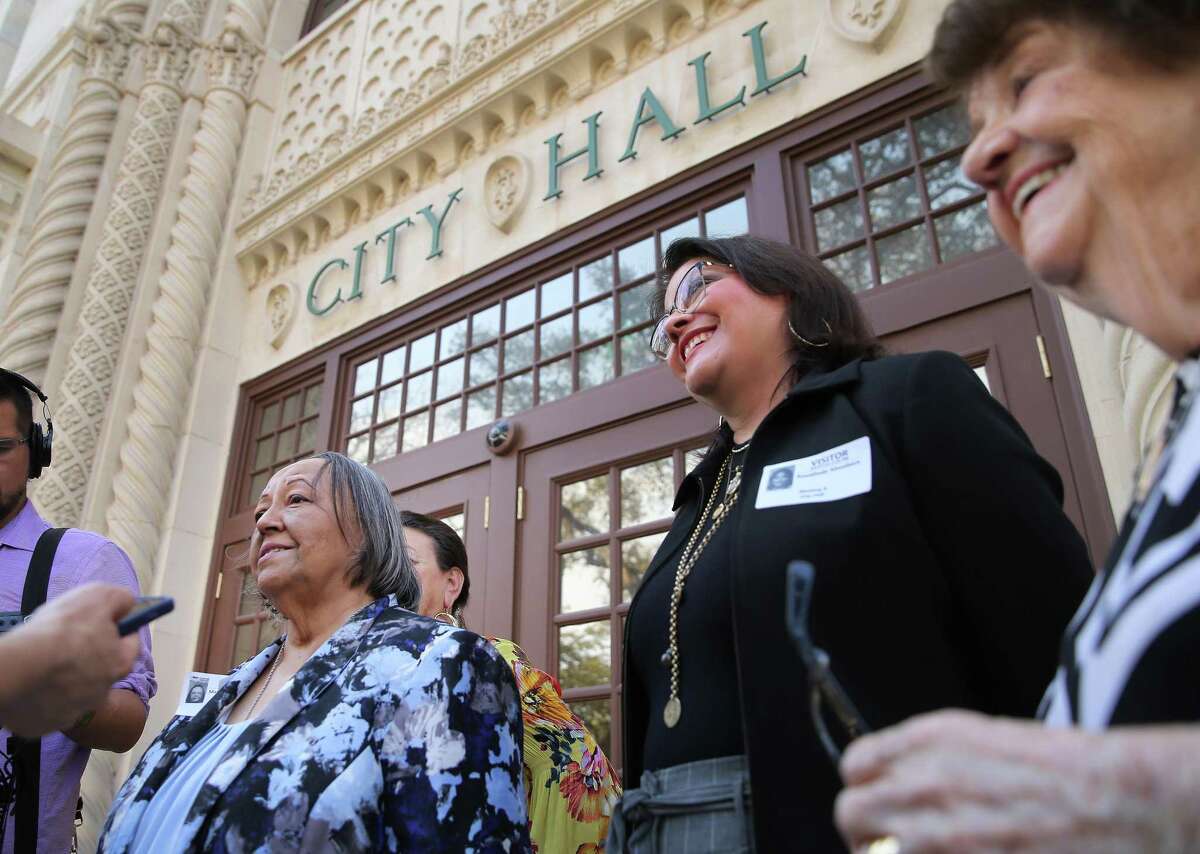 Rosie Castro (second from left) addresses the media after City Council votes to appoint her as the interim District 7 councilperson to replace Ana Sandoval on Wednesday, Mar. 1, 2023. Castro will be officially sworn in to office on Thursday - a position she will hold for at least the next three months.