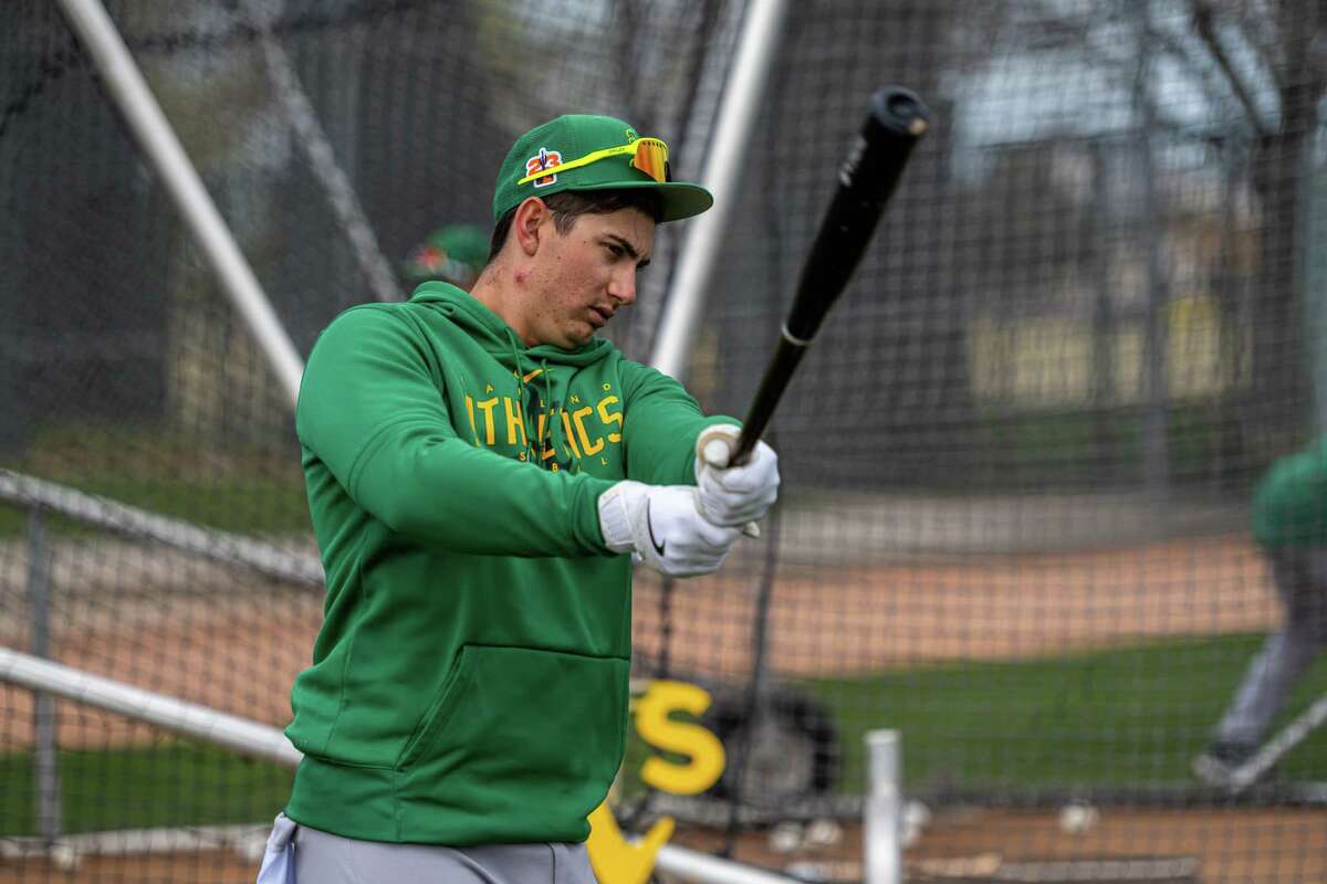 Tyler Soderstrom, the A's top prospect, practices at the team's spring training facility,  Hohokam Stadium, in Mesa, Ariz., on Wednesday. 
