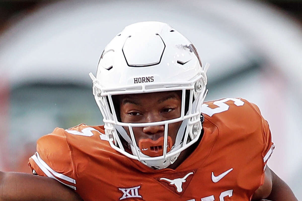Texas running back Bijan Robinson not only offers elite rushing skills but provides value as a pass catcher.