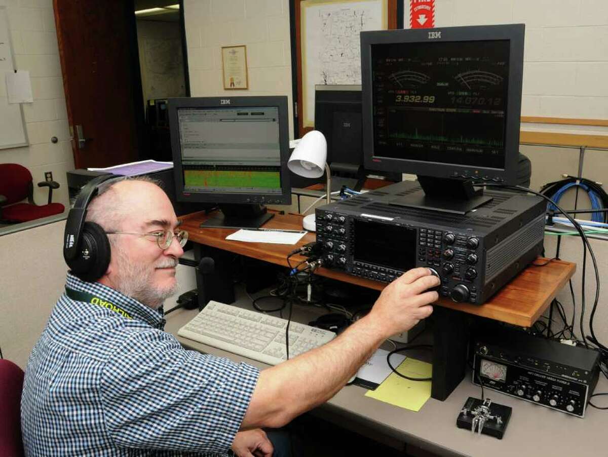 Harlan Ford, of Danbury, mans a ham radio at the Emergency Operations Center at Danbury City Hall, on Tuesday, Oct. 3, 2010.