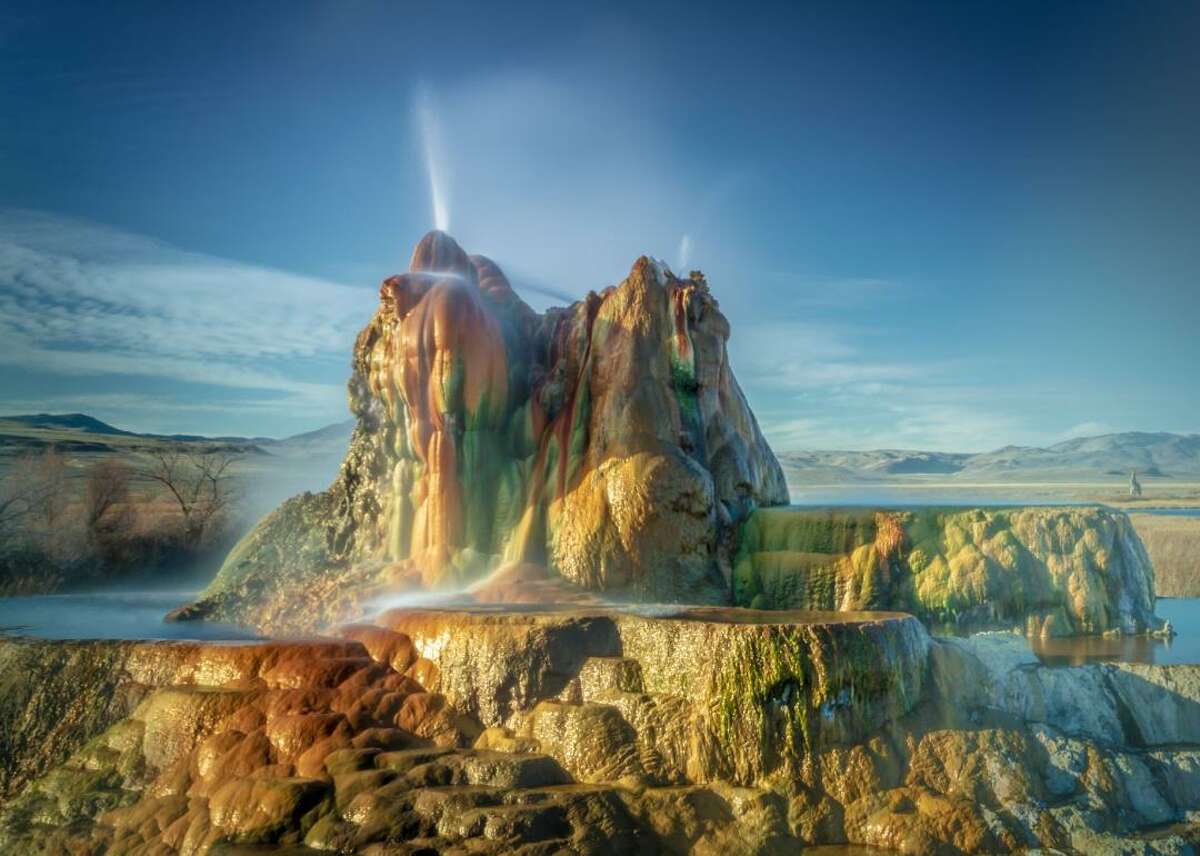 The wonders of Fly Geyser in northern Nevada The Fly Geyser was accidentally created in 1964 as a result of an artesian well, but the results are still spectacular. Because different mineral deposits—such as algae, iron, and sulfur—coexist, the water from the geyser spews five feet in the air in numerous vibrant colors. Although Fly Geyser is located on private property, visitors can still book tours to see it on the weekends.