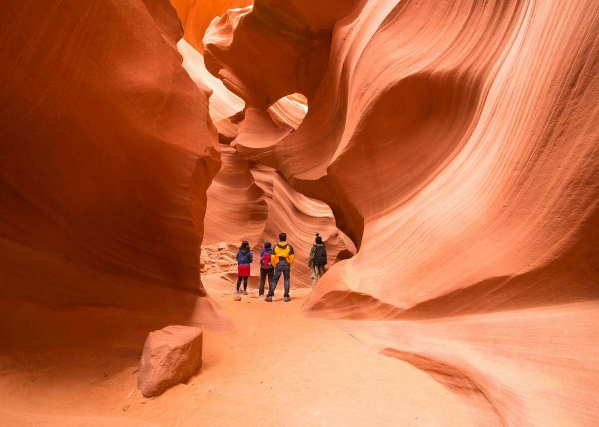 Drive through Antelope Canyon in Page, Arizona Although the town of Page, Arizona, is located five hours from major cities like Las Vegas and Phoenix, the natural splendor of Antelope Canyon more than makes up for the trip. Visitors can tour the Slot Canyon formation's beautiful red and golden-hued, famously narrow turns.