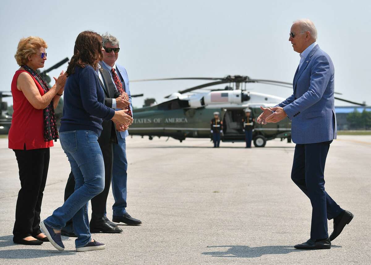 US President Joe Biden (right) steps off Air Force One upon arrival at Cherry Capital Airport in Traverse City, Michigan, on July 3, 2021. Courtesy photo/Mandel Ngan/AFP/Getty Images