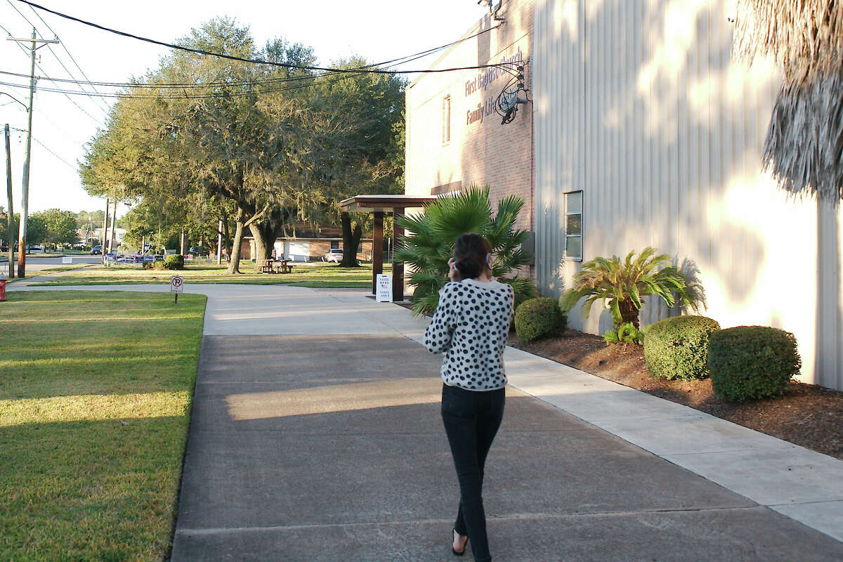 A Friendswood voter approaches the entrance of the Friendswood First Baptist Church polling location in a previous election. Voters in Friendswood, Dickinson and Kemah will consider contested races in the May 6 election. 