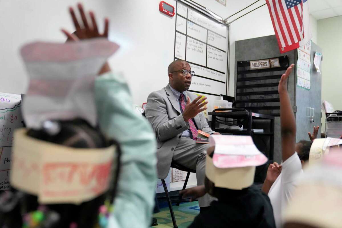 Houston ISD Superintendent Millard House II reads “Green Eggs and Ham” to kindergartners at Bruce Elementary School. The state of Texas appears poised to take over the biggest school district in the state, Houston ISD, in a matter of days.