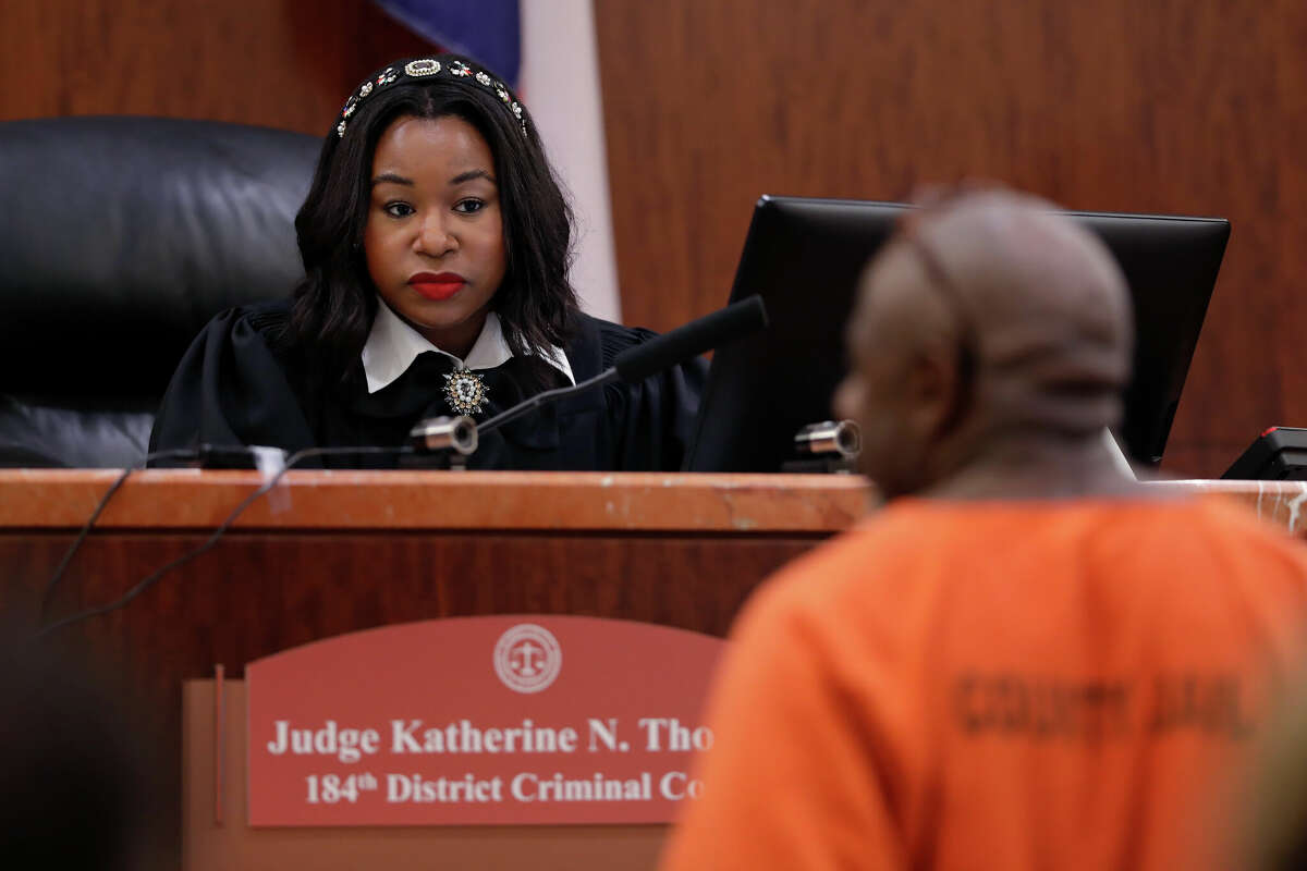 Judge Katherine Thomas, the youngest District judge in the state of Texas, talks with a defendant during a sentencing hearing as she presides over cases from her bench in 184th District courtroom in the Harris Co. Criminal Courthouse Friday, Feb. 24, 2023 in Houston.