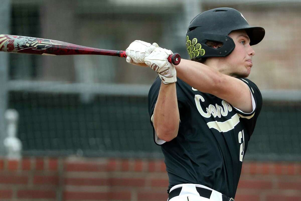 Jackson Todd #23 of Conroe hits a sac-fly to tie the game 3-3 in the second inning of a high school baseball game during the Ferrell Classic at Conroe High School, Thursday, March 2, 2023, in Conroe.