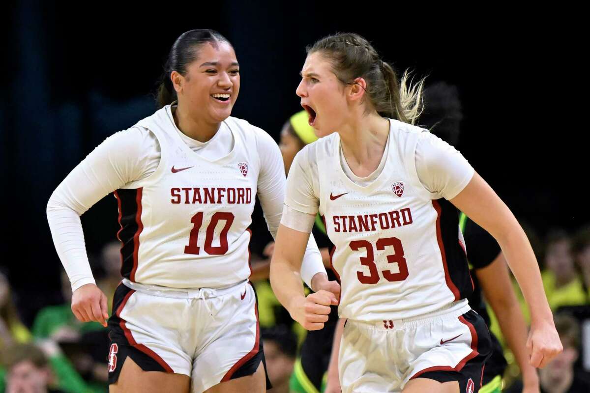 Stanford guard Talana Lepolo (10) and guard Hannah Jump react after a 3-point basket against Oregon during the first half of a Pac-12 women's tournament quarterfinal Thursday in Las Vegas.