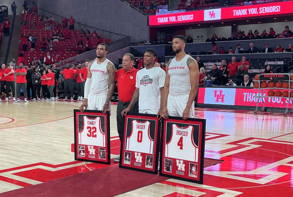 From left, Reggie Chaney, Kelvin Sampson, Marcus Sasser and Darius Bowser of the Houston Cougars pose during senior night, March 2, 2022, at the Fertitta Center in Houston.