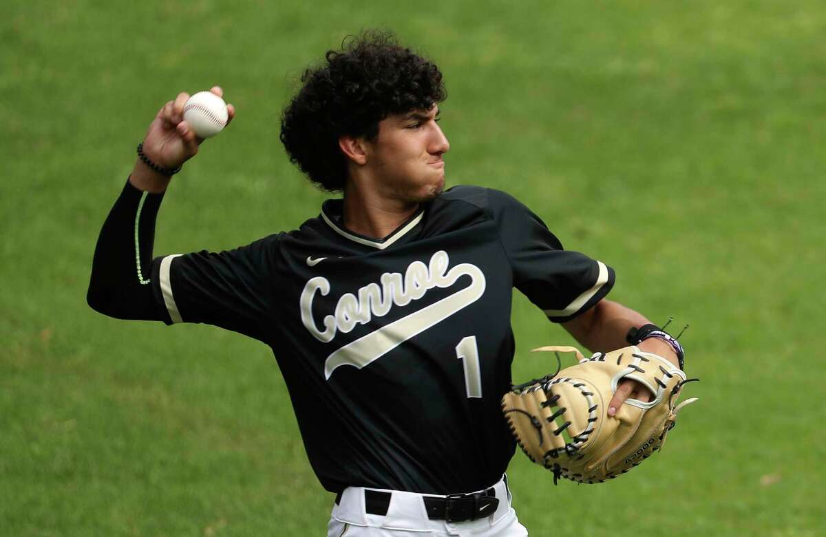 Conroe catcher Eli Medina (1) warms up before a high school baseball game during the Ferrell Classic at Conroe High School, Thursday, March 2, 2023, in Conroe.