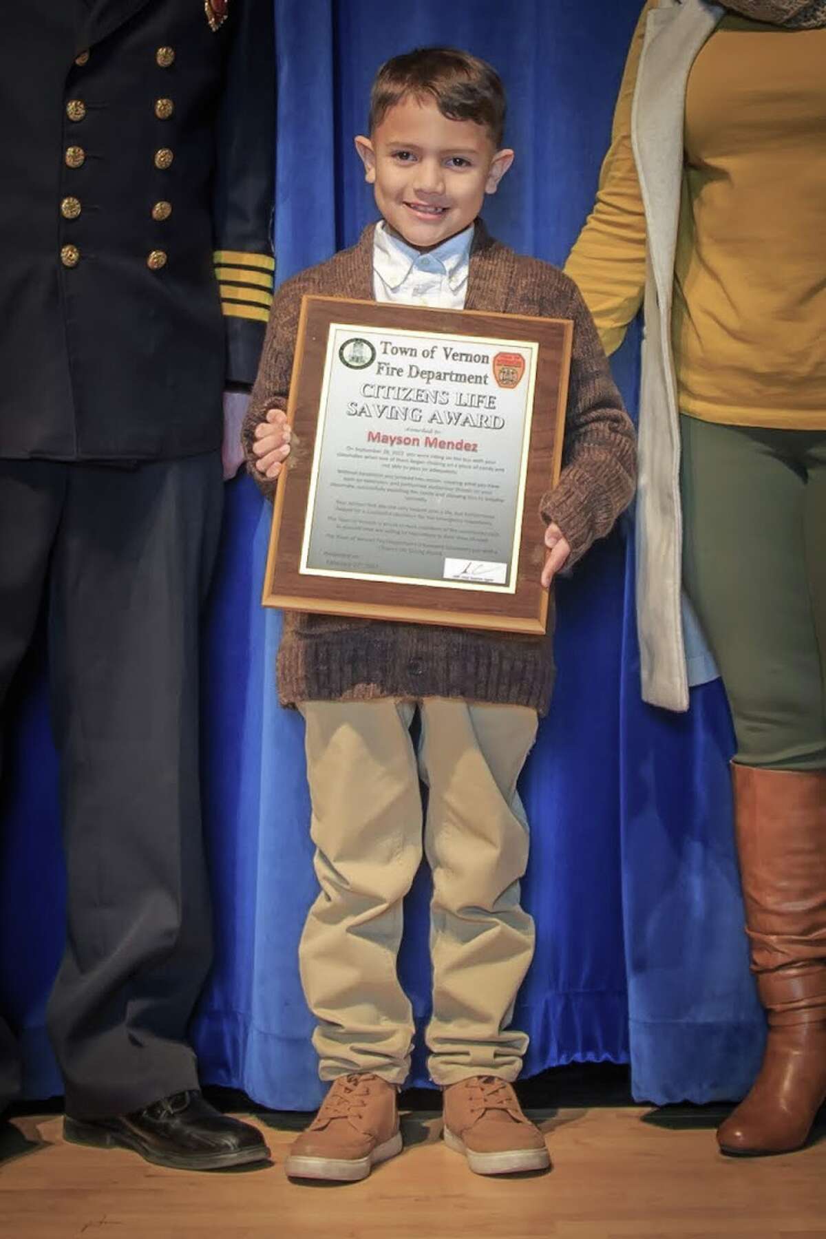 Mayson Mendez, 9, of Vernon, was honored with the Vernon Fire Department's Citizens Life Saving Award Monday night for saving the life of a choking schoolmate in September, according to town officials. He was 8 at the time.