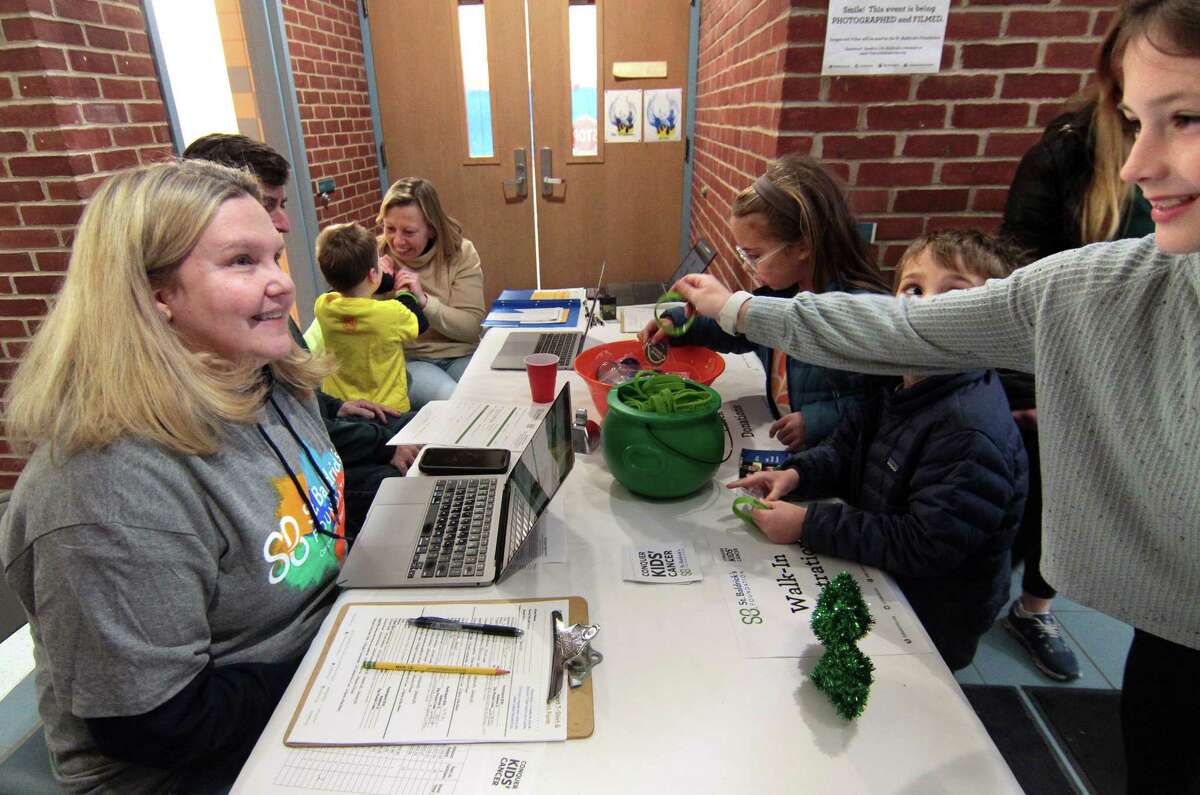 Photos: Greenwich students, teachers shave their heads for cancer