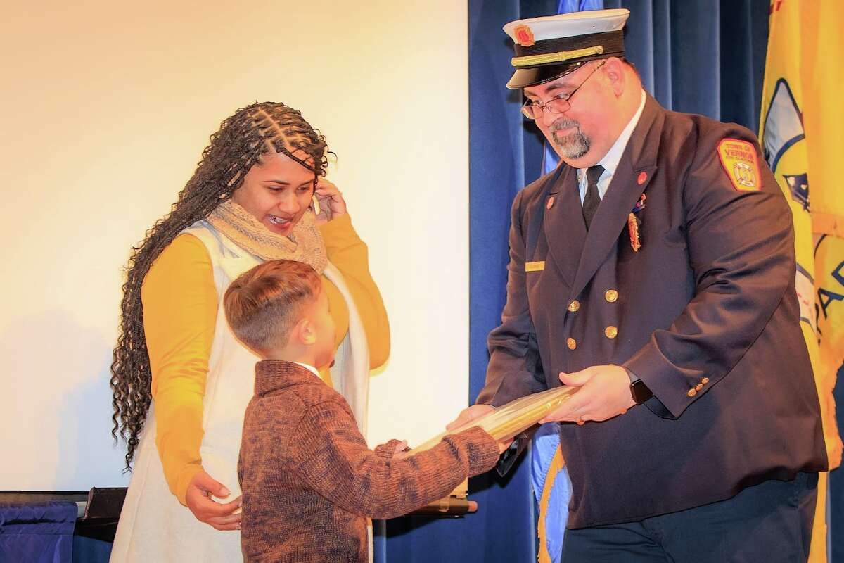 Mayson Mendez, 9, of Vernon, was honored with the Vernon Fire Department's Citizens Life Saving Award Monday night for saving the life of a choking schoolmate in September, according to town officials. He was 8 at the time.