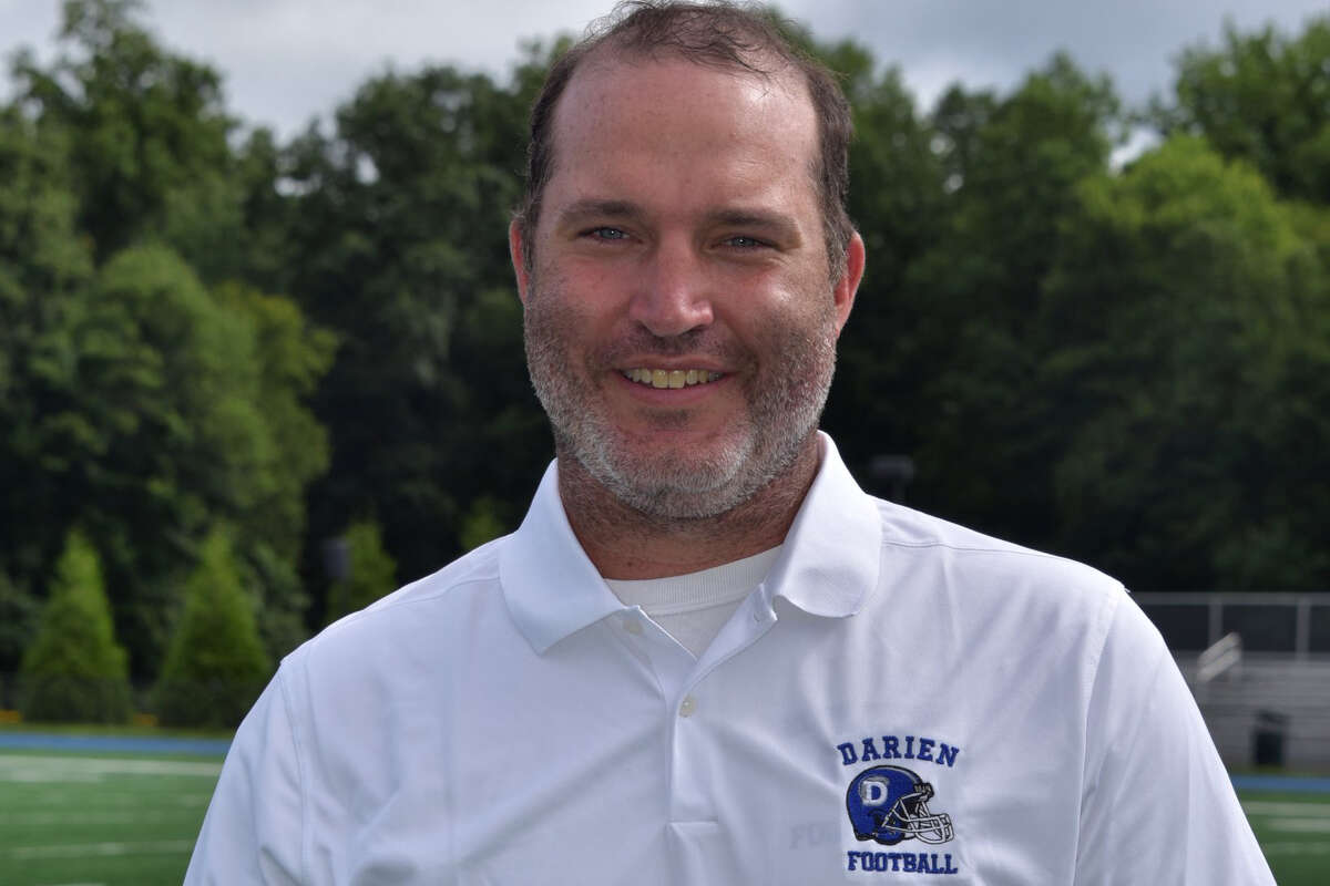 Darien's Andy Grant is the new football coach.
