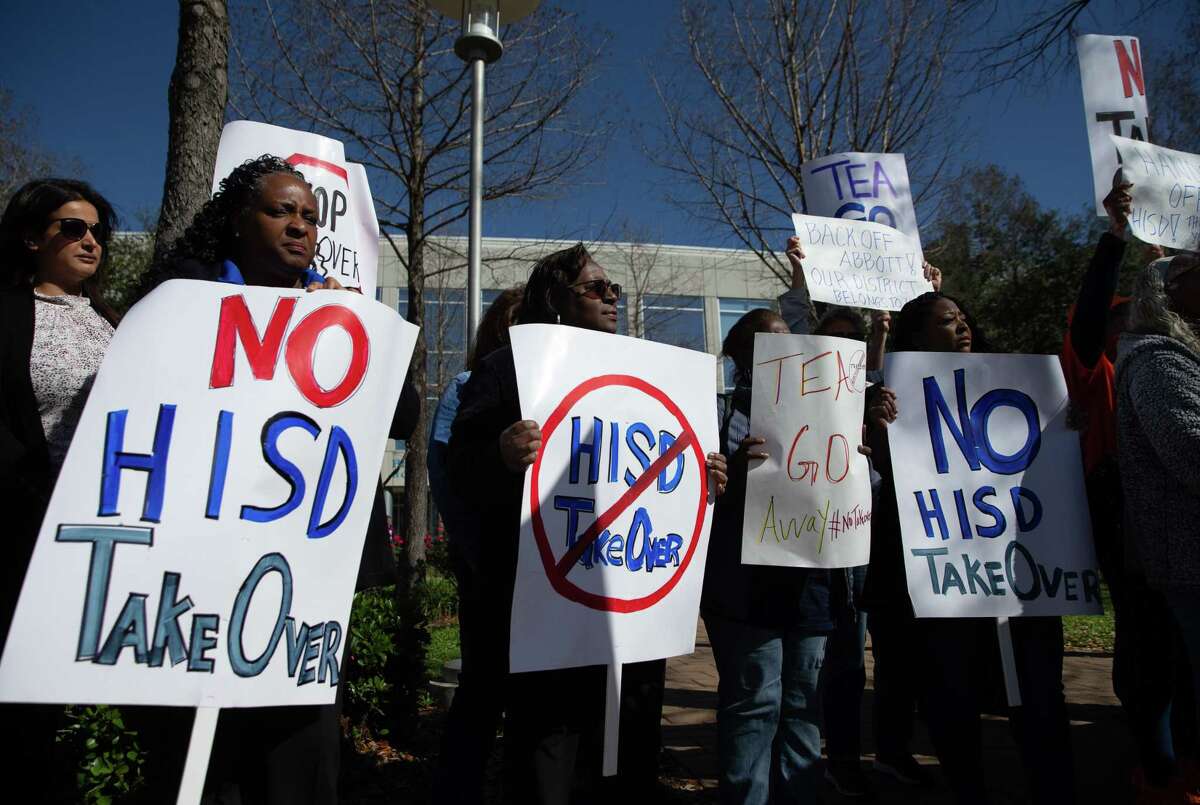 People protest against TEA takover of HISD outside the admin building Friday, March 3, 2023, at Hattie Mae White Educational Support Center in Houston.