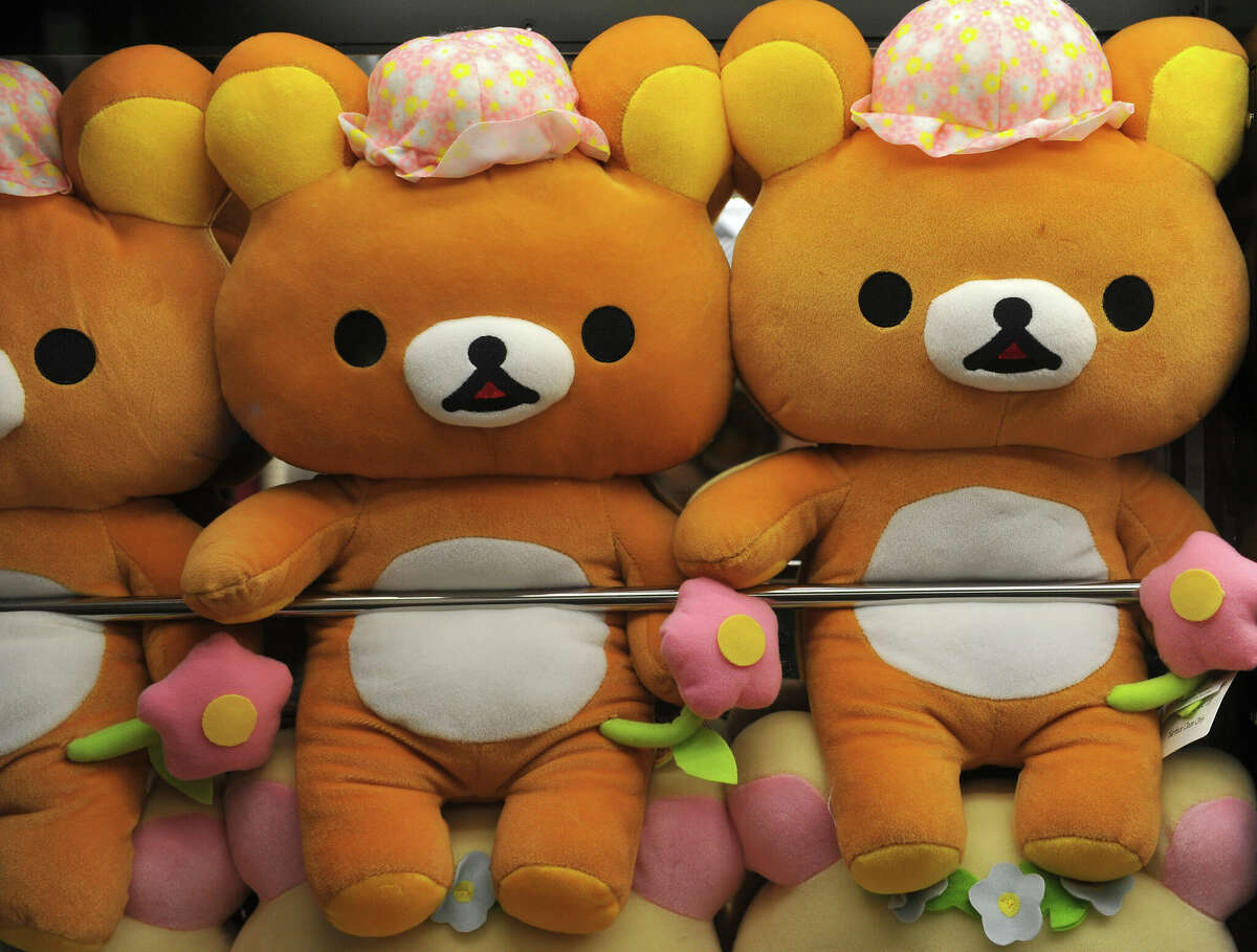 Rilakkuma, a Tomagotchi plushie, sits in one of the crane games at Round1.