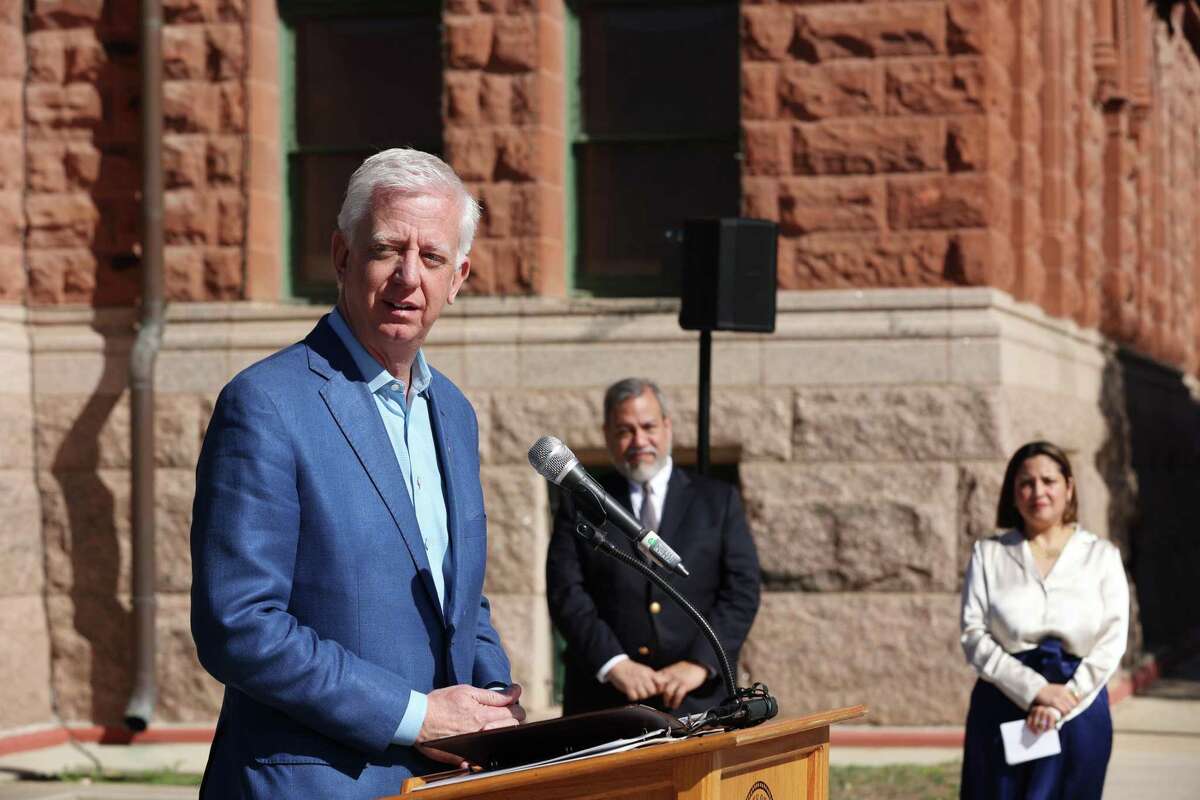 Gordon Hartman speaks during a ribbon-cutting of “drop off” and “pick up” zones for accessibility at the Bexar County Courthouse on Friday.