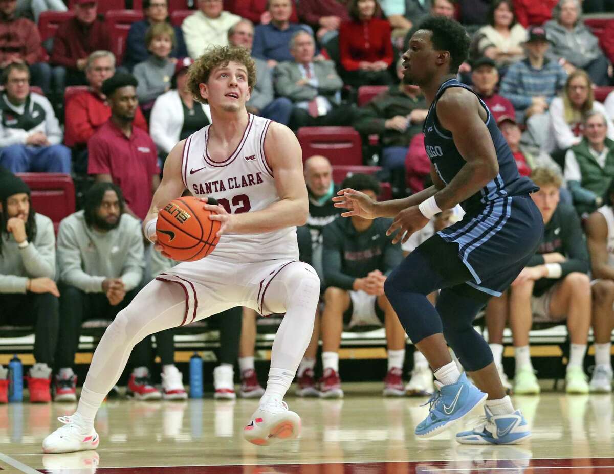 Steve Nash, Guard for the Santa Clara University Broncos dribbles