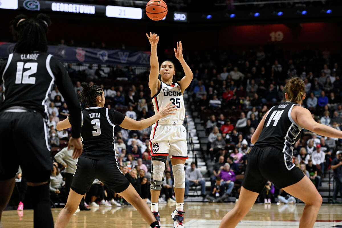 UConn's Azzi Fudd (35) shoots over Georgetown's Victoria Rivera (3) during the second half of an NCAA college basketball game in the quarterfinals of the Big East Conference tournament at Mohegan Sun Arena, Saturday, March 4, 2023, in Uncasville, Conn. (AP Photo/Jessica Hill)