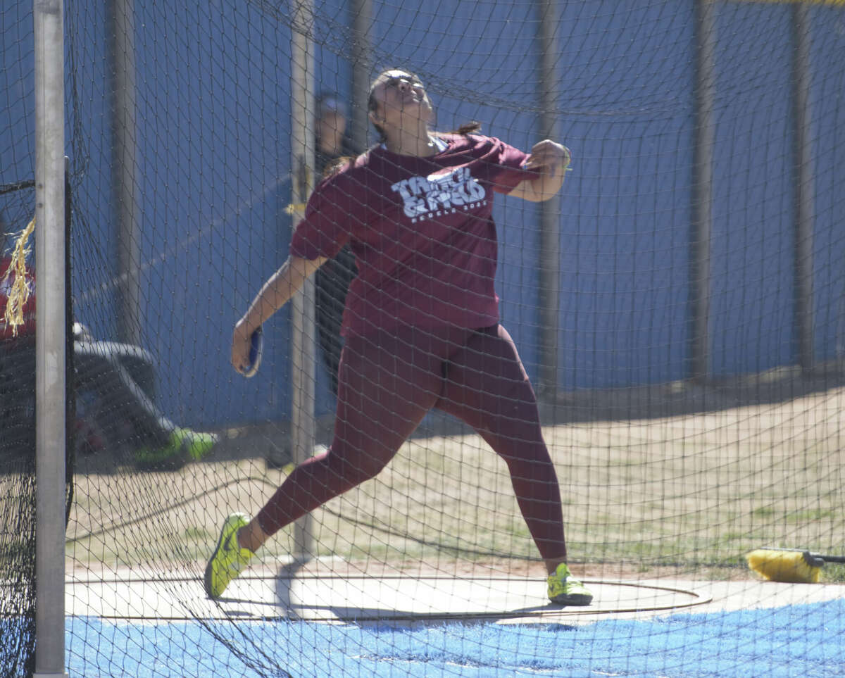 Legacy's Leah Acosta makes a warm up throw in the girls discus during the Ranger Relays track and field meet, March 4 at J.M. King Memorial Stadium. 