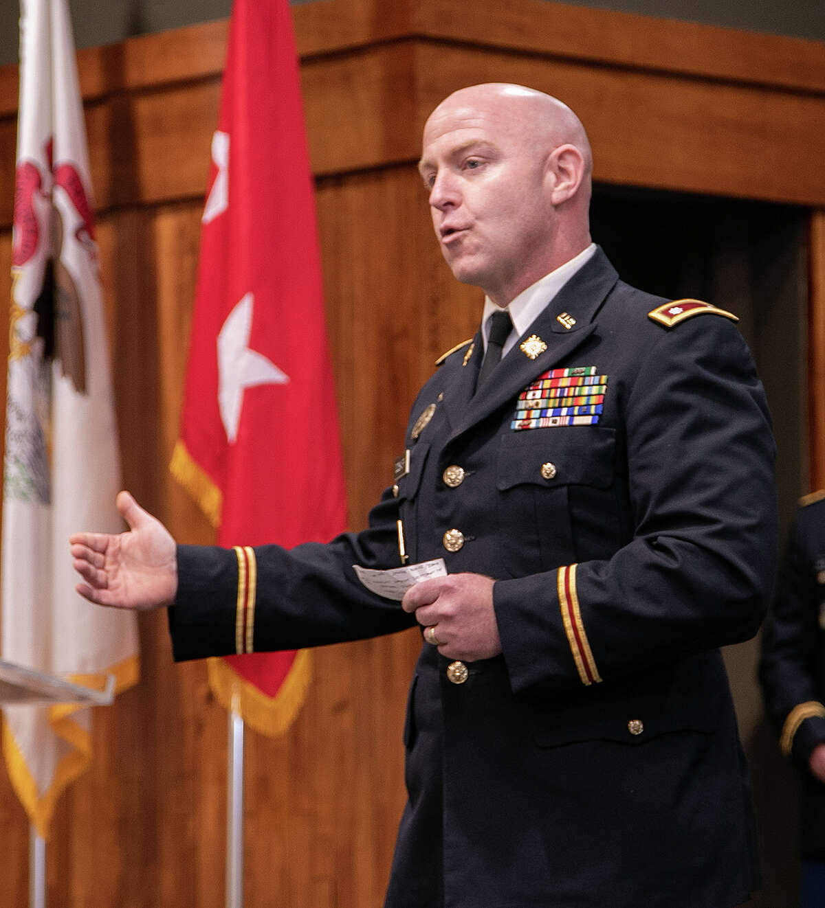Newly promoted Lt. Col. Matthew Dodsworth thanks family and friends for their support throughout his career at a promotion ceremony at the Illinois Military Academy at Camp Lincoln.