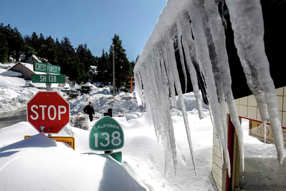 Snow surrounds businesses in Crestline, Calif., on Friday following a huge snowfall that buried homes and businesses. 