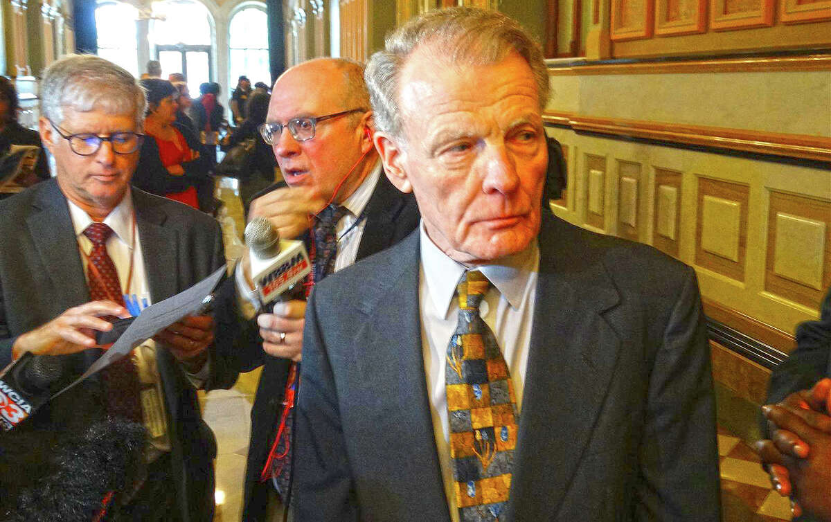 Former House Speaker Michael Madigan talks to reporters in 2019 at the Capitol in Springfield.